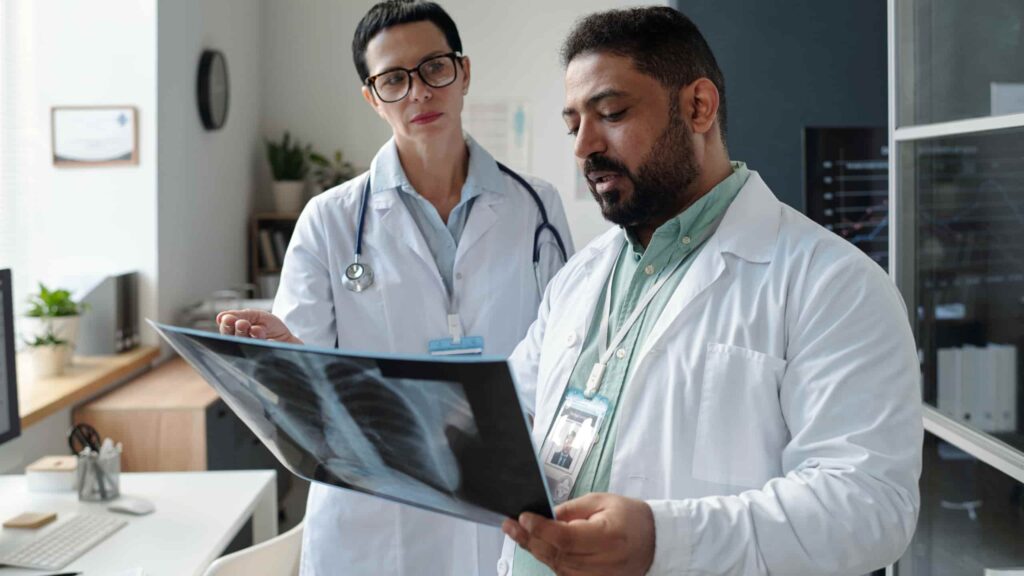 Doctor examining lungs using advanced pulmonology technology.